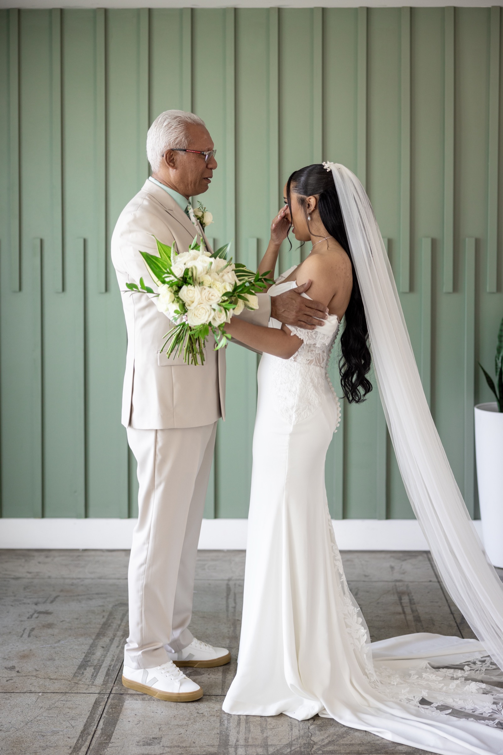 Rachel's father seeing her in her wedding dress for the first time at The Colony House