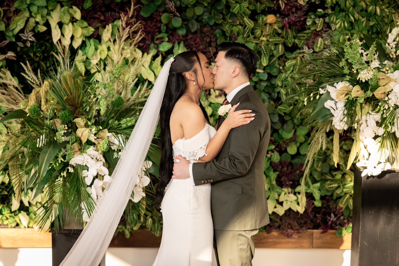 Rachel smiling through her lace veil, artistic bridal portrait at The Colony House