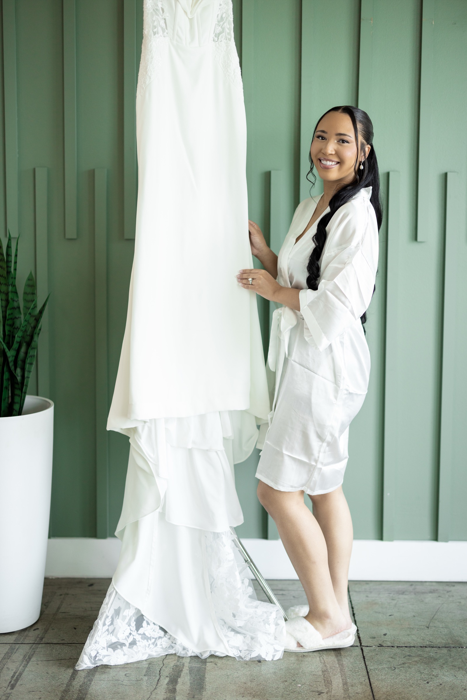 Kevin kissing Rachel on the cheek, couple portrait at The Colony House wedding