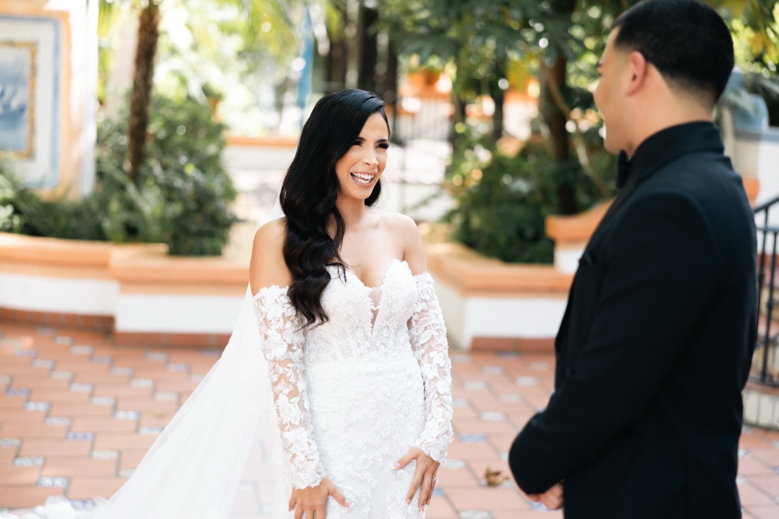 Michelle smiling at Mikey during their first look at Rancho Las Lomas