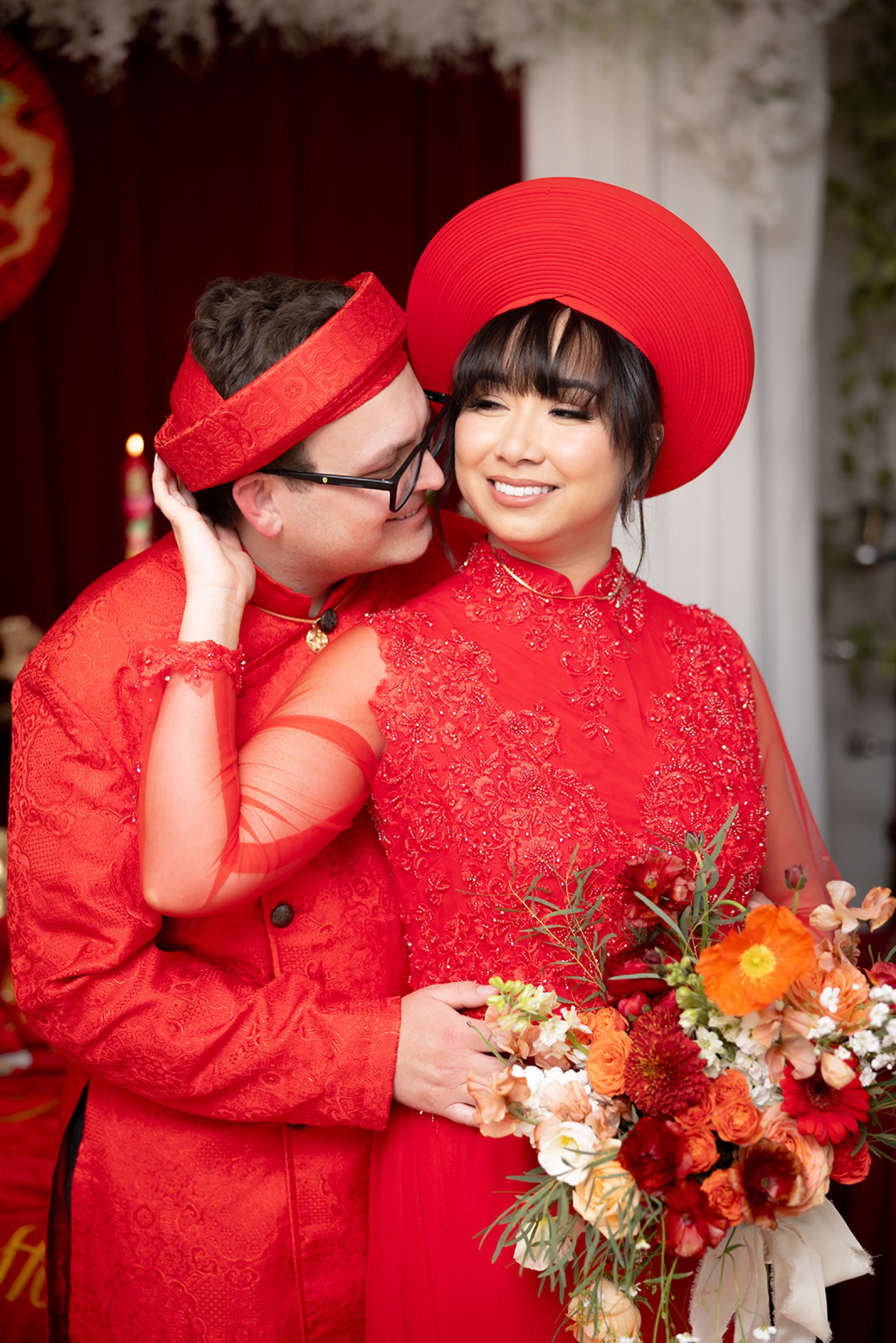 Janet and Ryan in traditional Vietnamese ao dai during their intimate tea ceremony