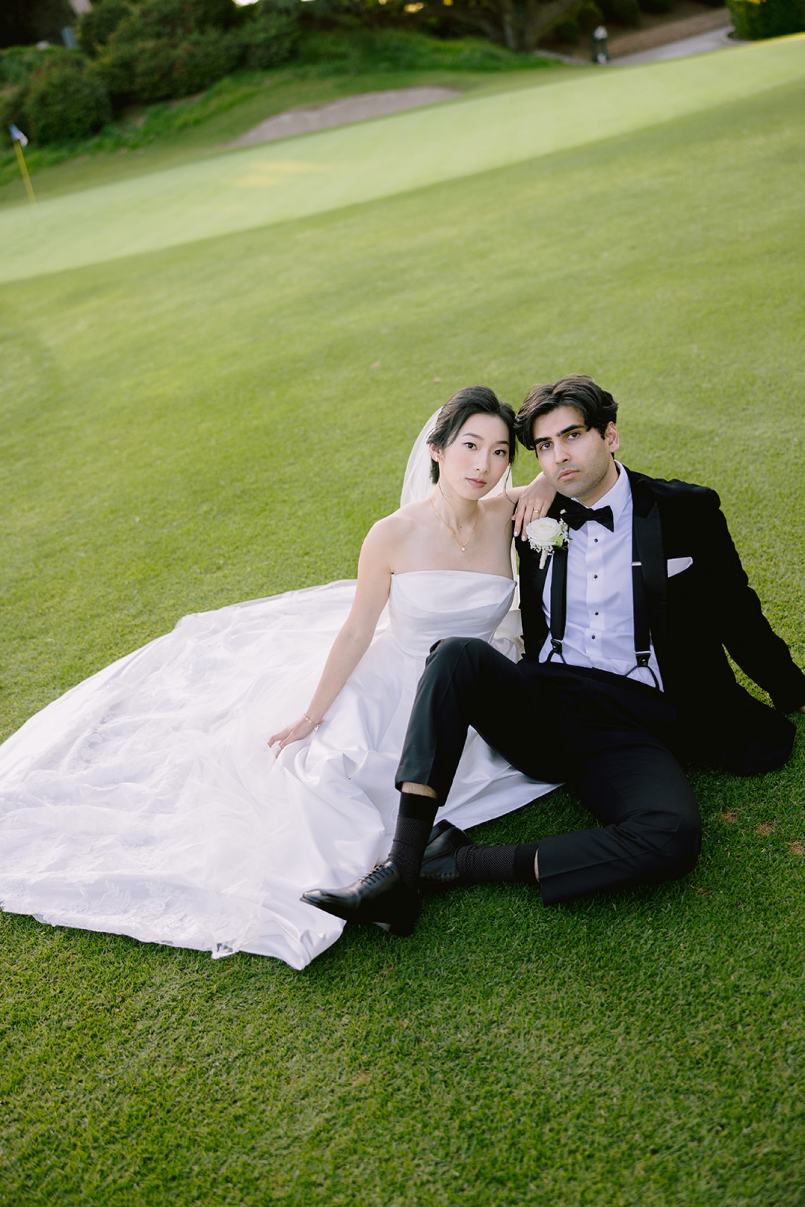 Couple sitting together on the green at South Hills