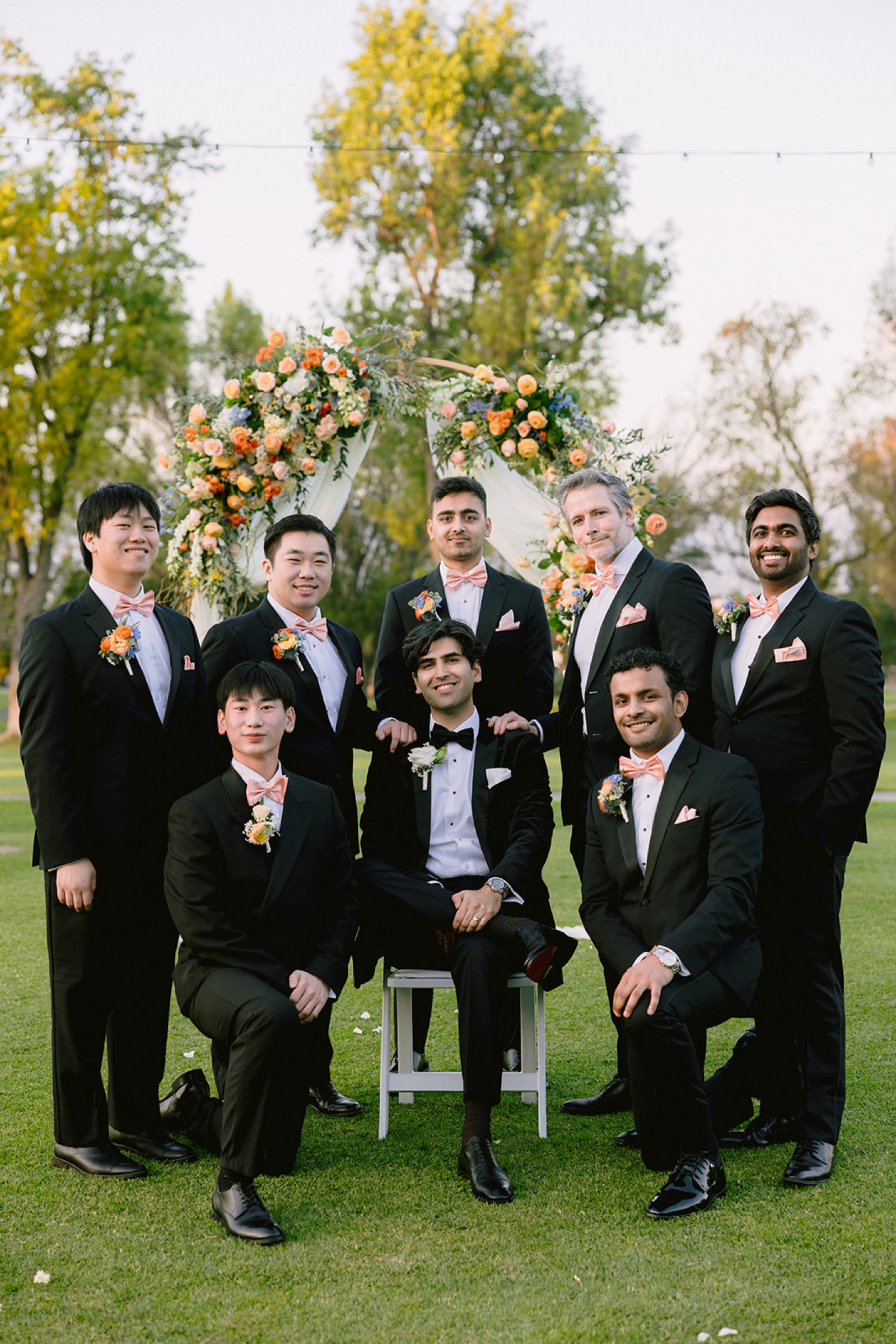 Groomsmen smiling in group photo at South Hills