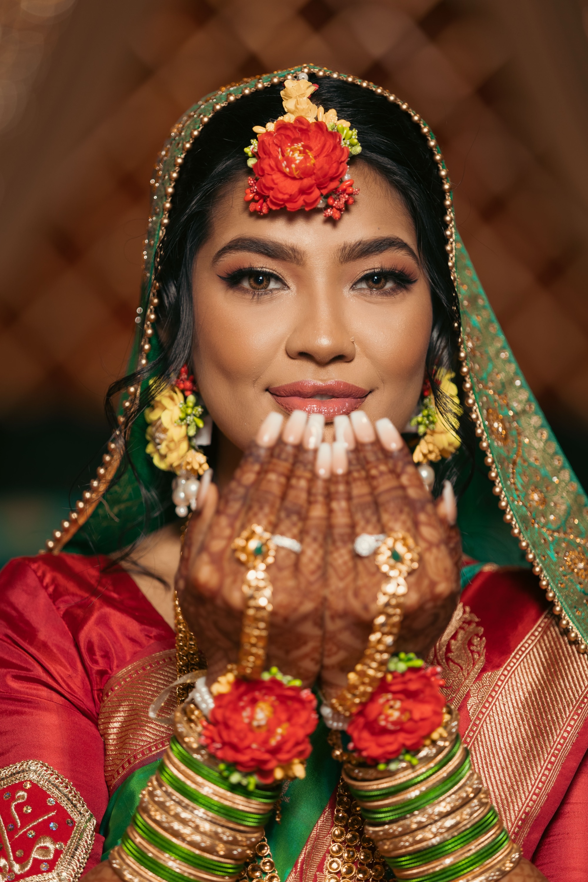 Bride in traditional attire photographed by Bokeh Weddings