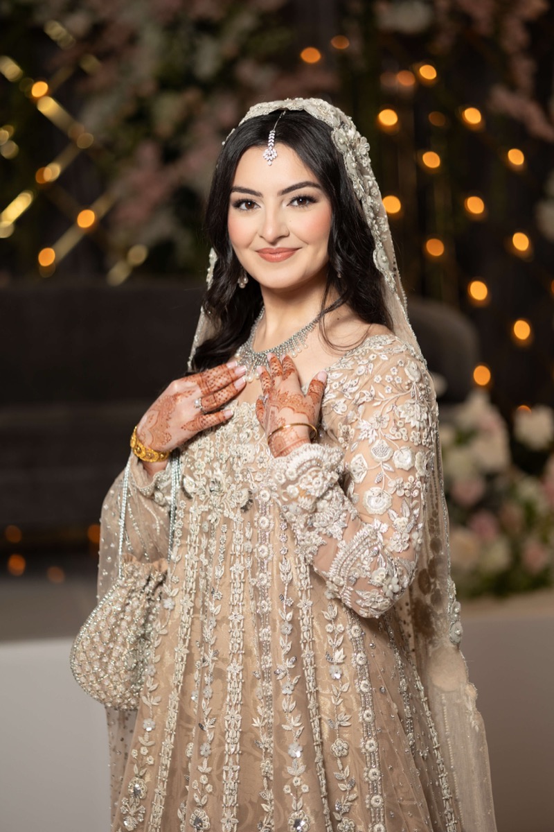 Indian bride in traditional wedding attire photographed by Bokeh Weddings